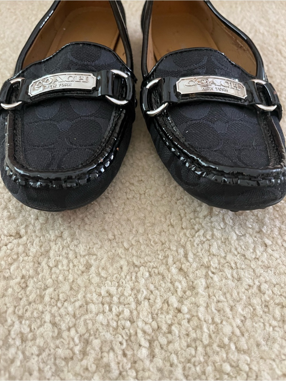 Coach Womenโs Black Signature Loafers